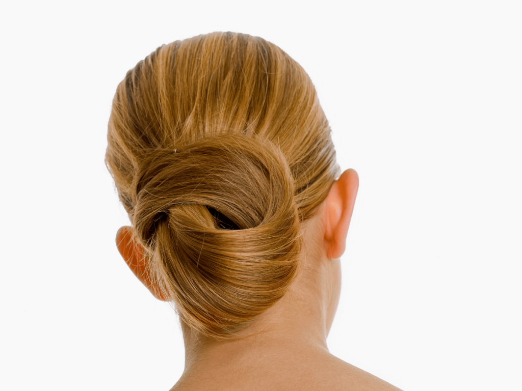 woman modeling  low tied updo hairstyle