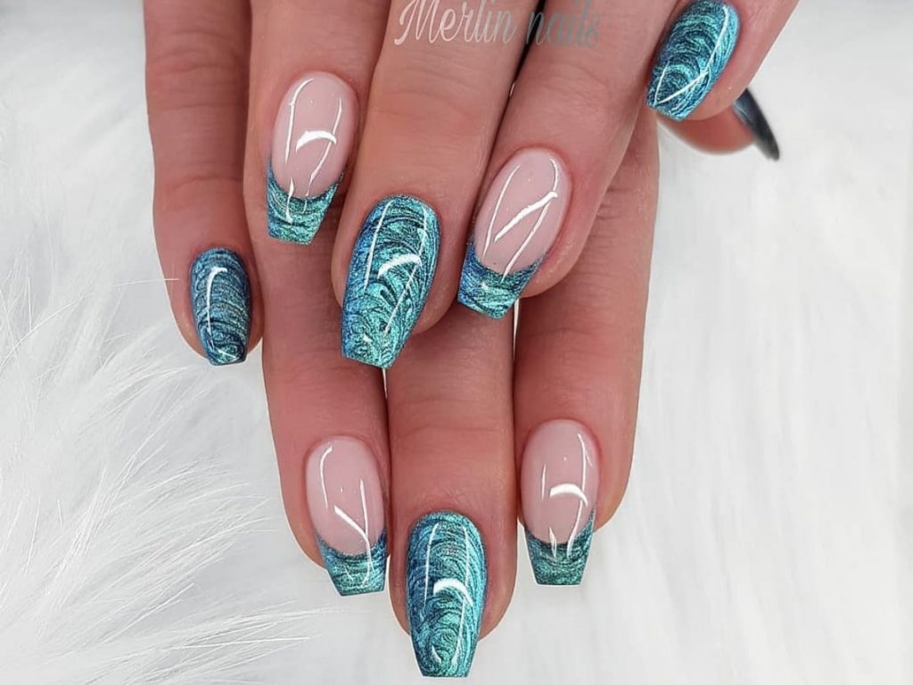 Natural color bridal nails paired with blue and turquoise artwork present a very fresh and colorful look.