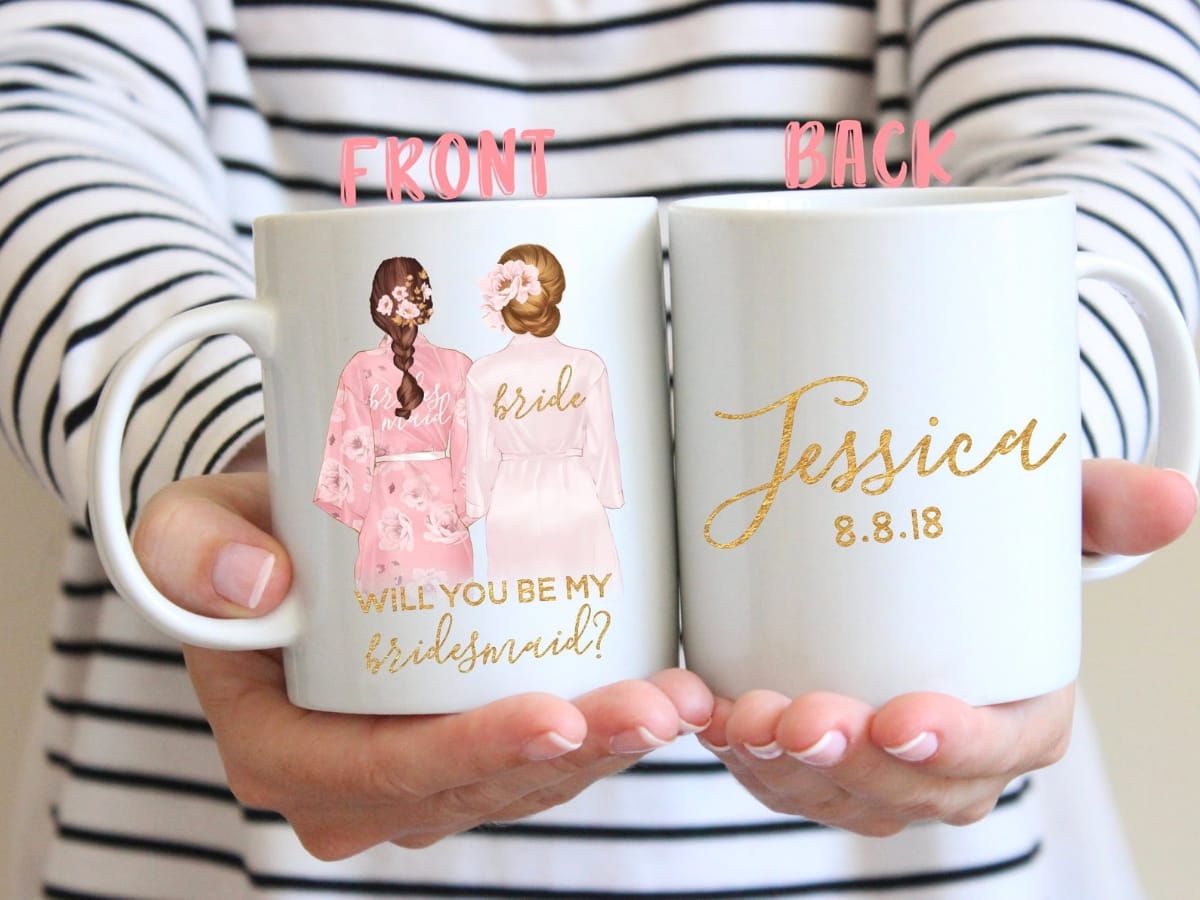 Coffee cup that says will you be my bridesmaid? 