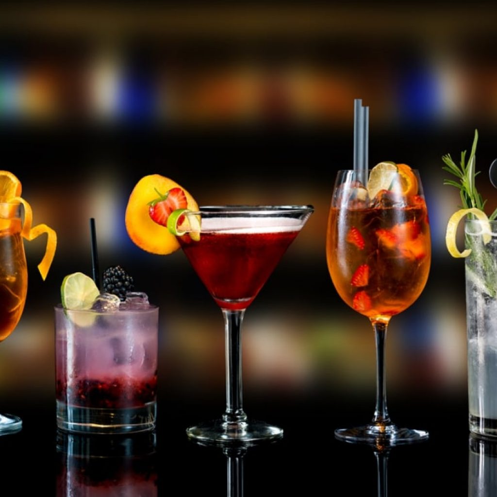 Different cocktails served in different glasses