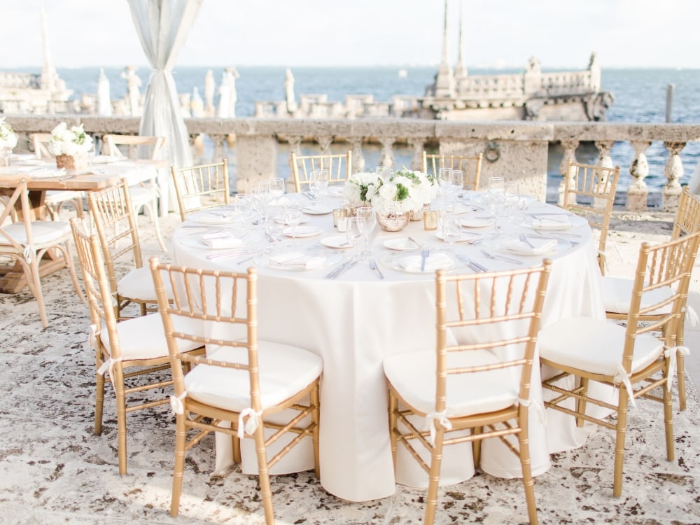 A decorated table at a waterfront michigan wedding venue.